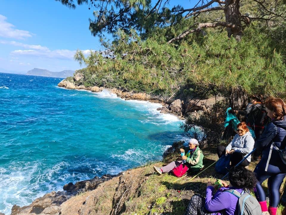 Hiking group in winter having lunch in Mersincik